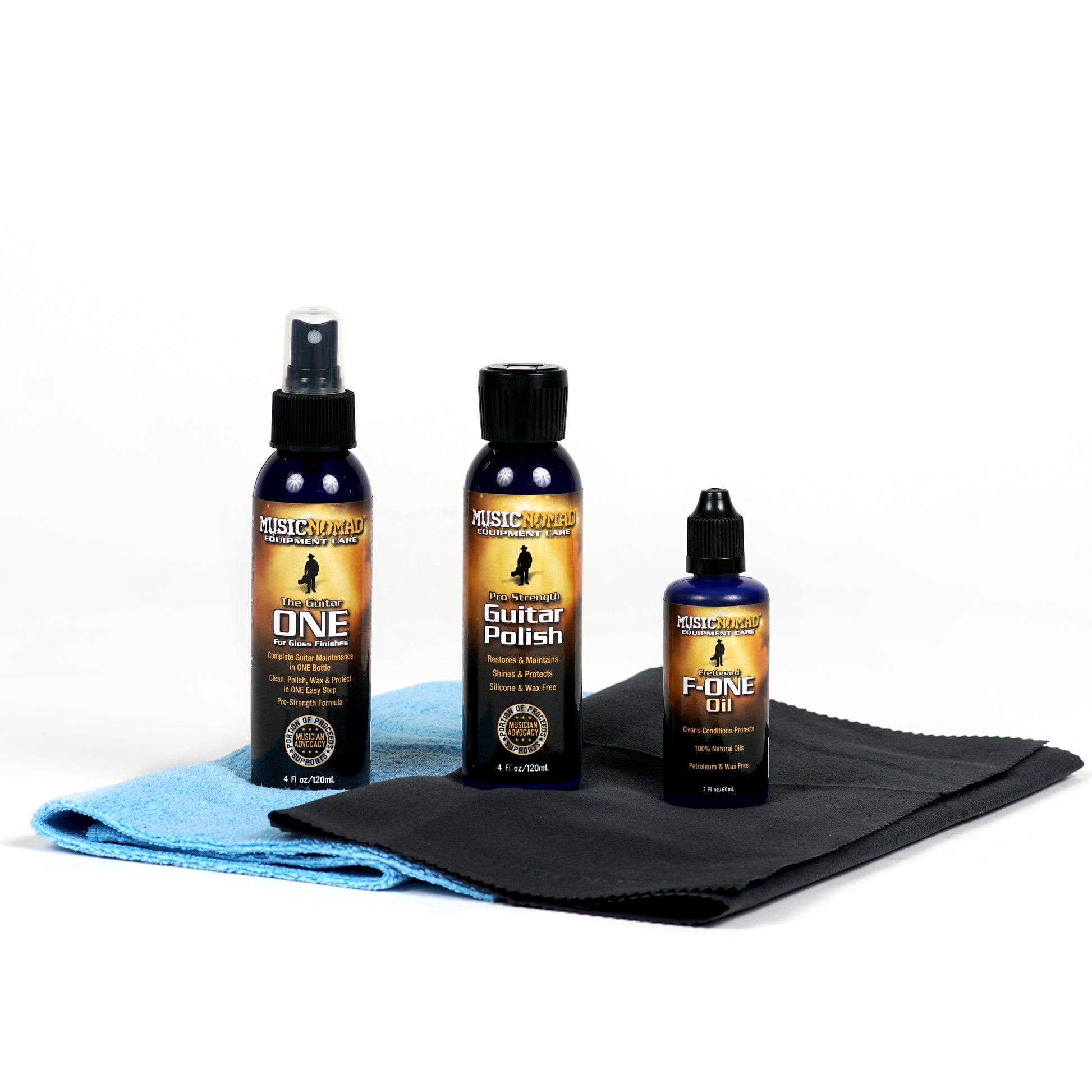 MUSICNOMAD GUITAR COMPLETE CLEANING CARE KIT MN108 BOTTLES ON CLOTHES ON WHITE BACKGROUND