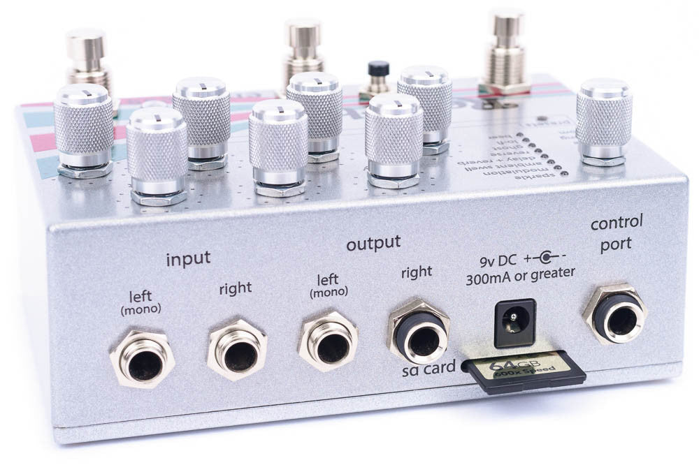 EMPRESS EFFECTS REVERB BACK ANGLED VIEW INPUT OUTPUT LEFT RIGHT MONO 9V DC INPUT CONTROL PORT SD CARD INPUT ON WHITE BACKGROUND