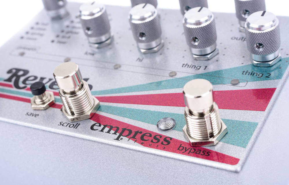 EMPRESS EFFECTS REVERB ZOOM FRONT FOOT SWITCHES ON WHITE BACKGROUND