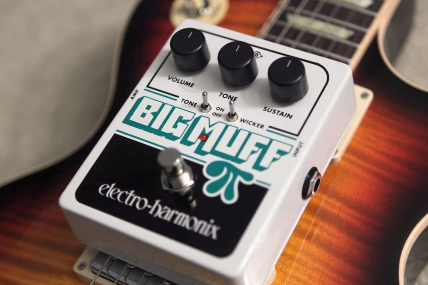 ELECTRO-HARMONIX EHX  BIGG MUFF WITH TONE WICKER FRONT ANGLE ON GUITAR IMAGE