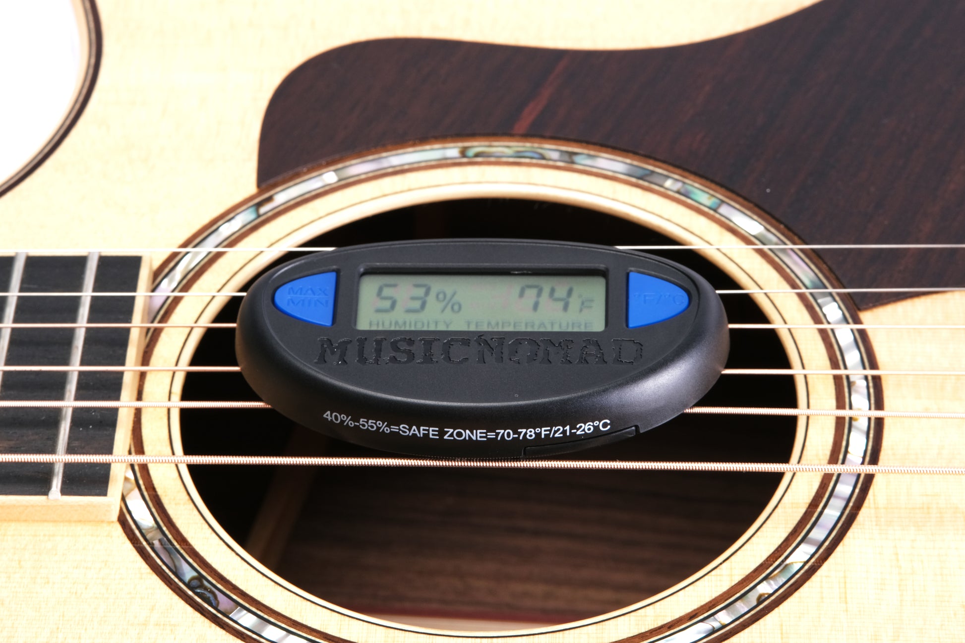  MUSICNOMAD MN312 GUITAR HYGROMETER FRONT TOP VIEW ANGLED IN ACOUSTIC GUITAR SOUNDHOLE